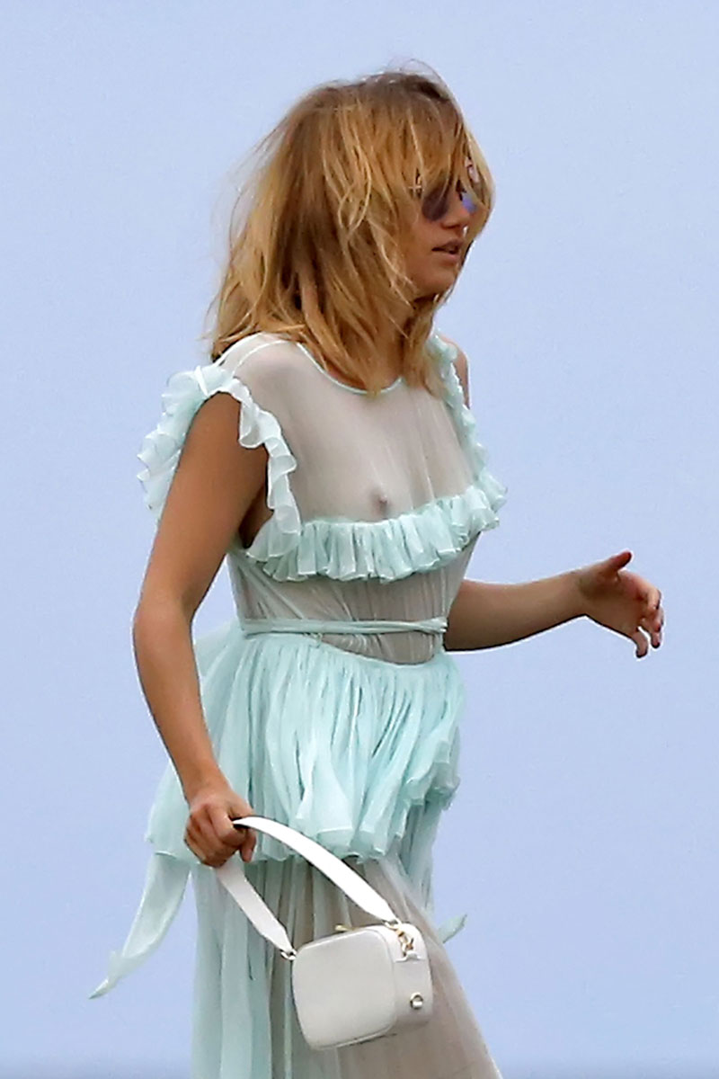 Suki Waterhouse Braless in White See Through Dress - Taxi Driver Movie